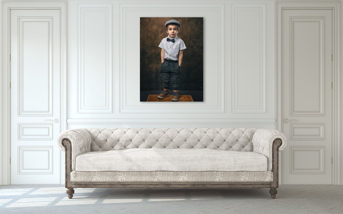 print of boy on living room wall